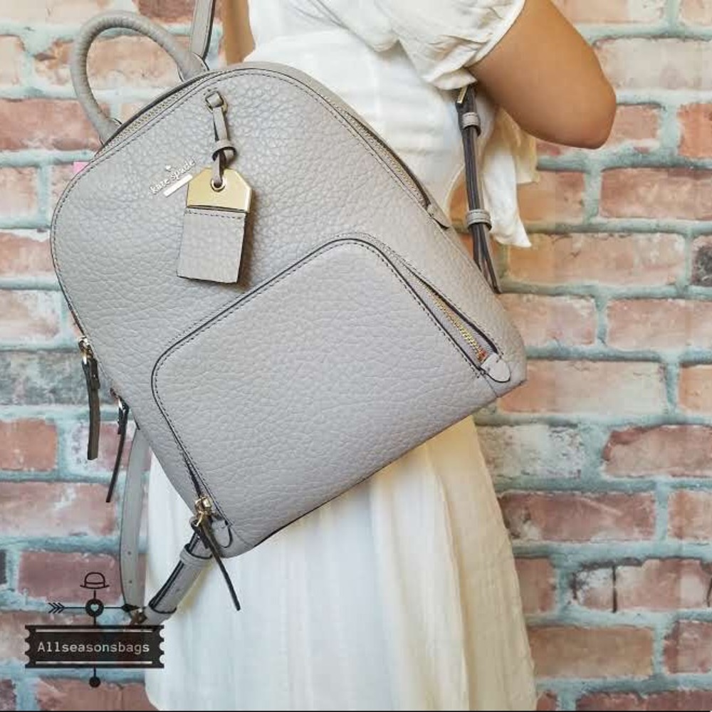 Kate Spade Caden Carter soft taupe gray backpack